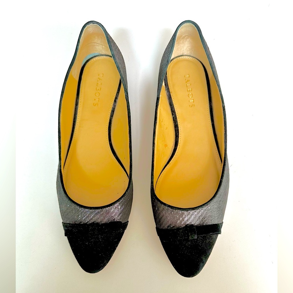 Silver metallic evening shoe with lovely black velvet toe and trimmings.